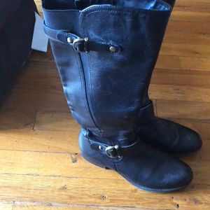 Black below-the-knee boots